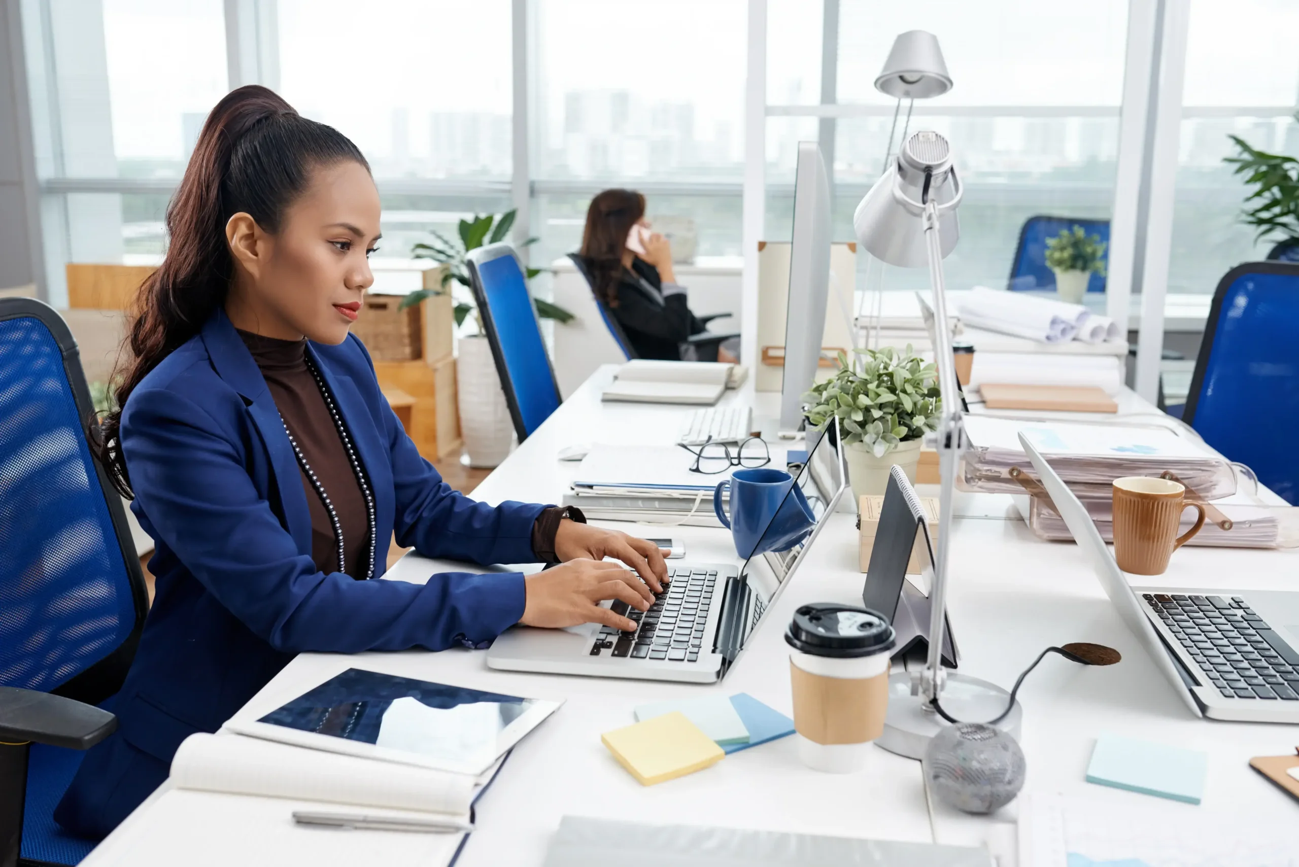 beautiful-asian-woman-sitting-desk-busy-office-working-laptop