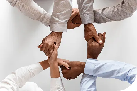 business-hands-joined-together-teamwork
